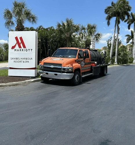 choose-img Why Choose Onyx Asphalt - Orange Asphalt Truck