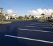 sealcoating and striping guide to asphalt surfaces - naples florida parking lot with sealcoated asphalt surphase
