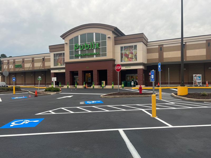 Parking lot of Publix with safety markings by Onyx Asphalt USA